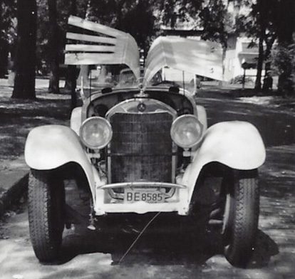 Black and white photo of a vintage car.